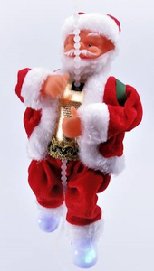 Mikołaj wspinający się po łańcuszku na baterie grający 